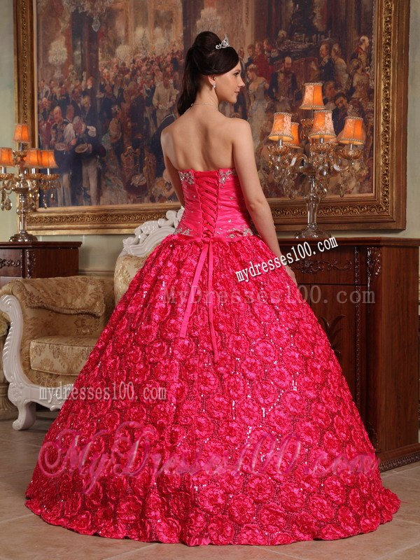Coral Red Appliques Accented Quinceanera Gown in Roling Flower Fabric