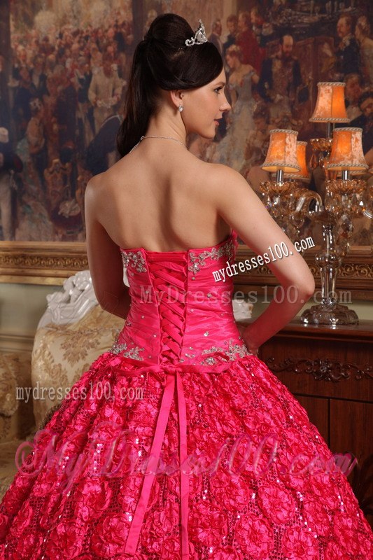 Coral Red Appliques Accented Quinceanera Gown in Roling Flower Fabric