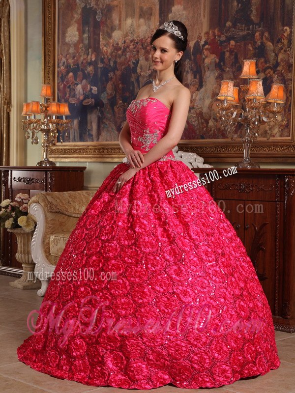 Coral Red Appliques Accented Quinceanera Gown in Roling Flower Fabric