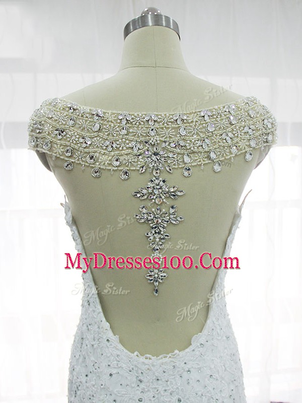 Ideal White Cap Sleeves Beading and Lace and Appliques Backless Bridal Gown