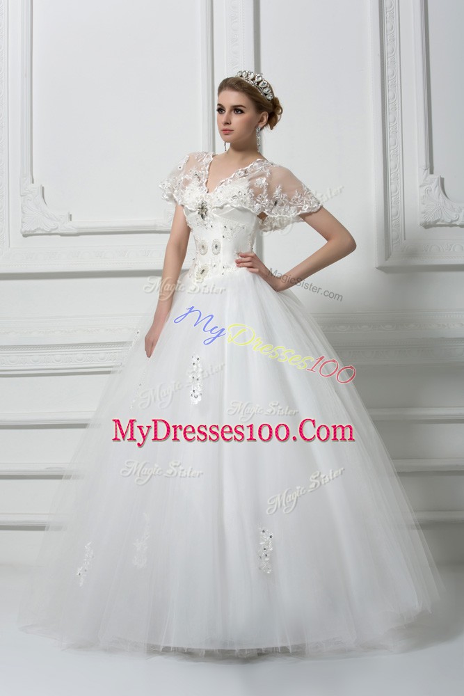 Fitting Tulle Short Sleeves Floor Length Wedding Gowns and Beading and Appliques
