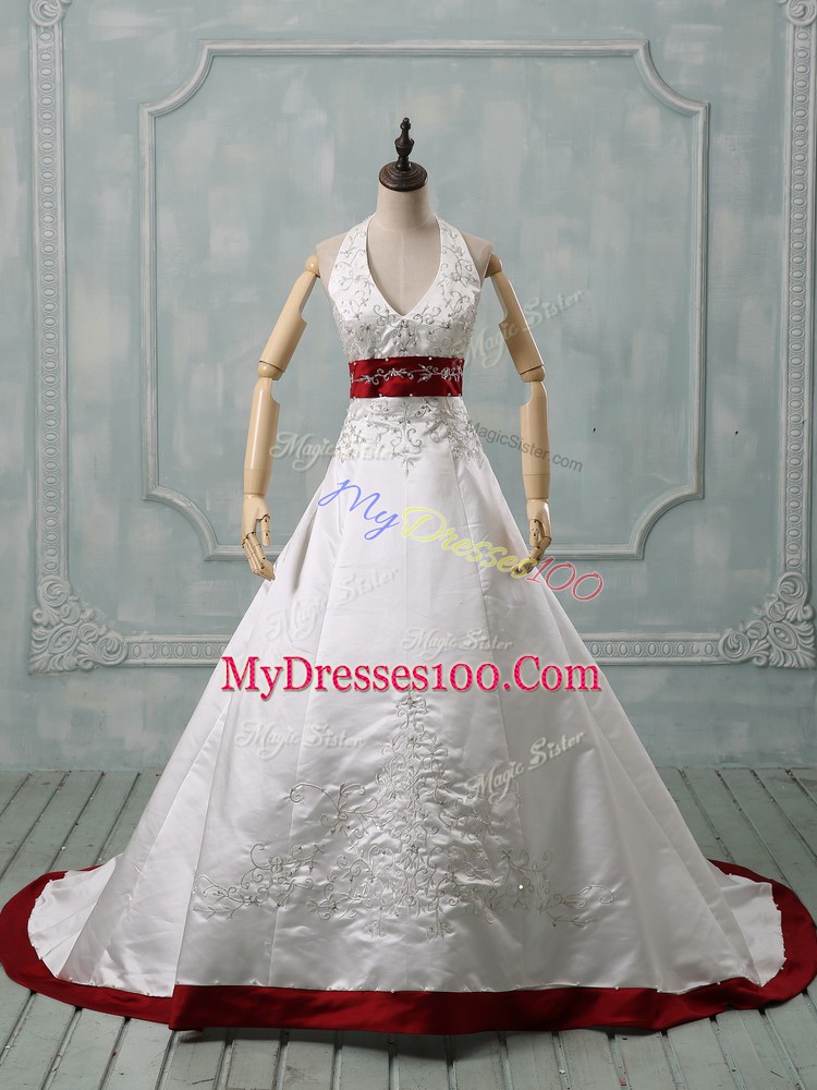 Dramatic White Halter Top Neckline Beading and Embroidery Wedding Gowns Sleeveless Lace Up