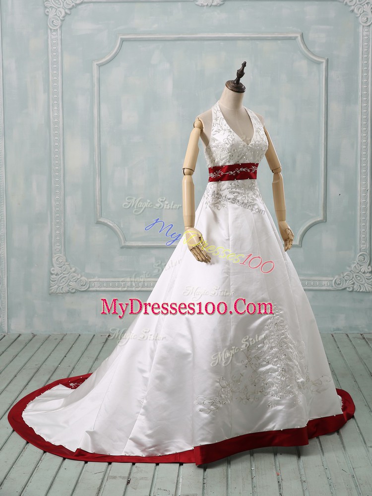 Dramatic White Halter Top Neckline Beading and Embroidery Wedding Gowns Sleeveless Lace Up