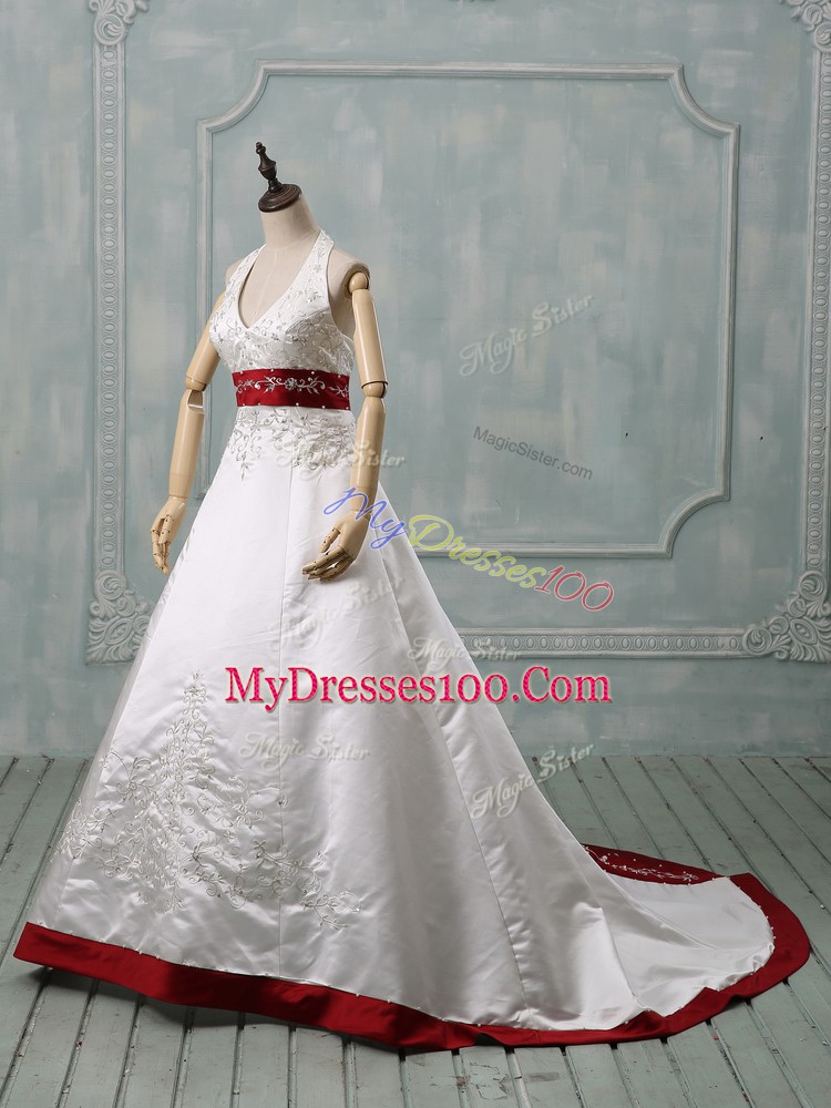 Dramatic White Halter Top Neckline Beading and Embroidery Wedding Gowns Sleeveless Lace Up