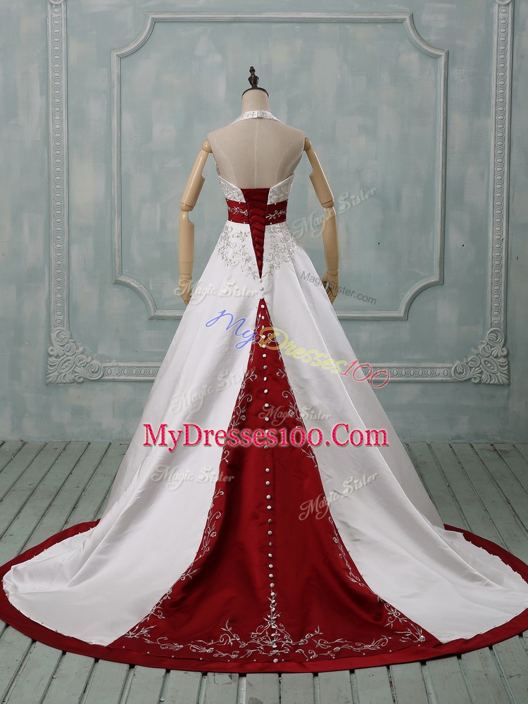 Dramatic White Halter Top Neckline Beading and Embroidery Wedding Gowns Sleeveless Lace Up