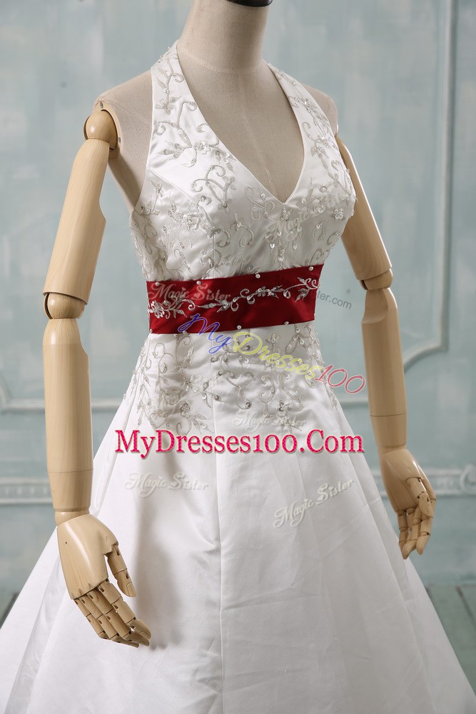 Dramatic White Halter Top Neckline Beading and Embroidery Wedding Gowns Sleeveless Lace Up