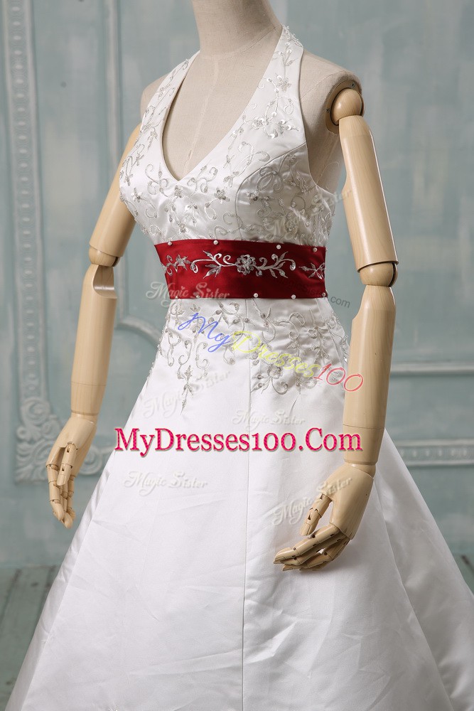Dramatic White Halter Top Neckline Beading and Embroidery Wedding Gowns Sleeveless Lace Up