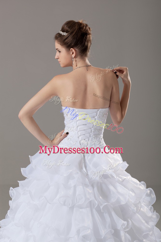 Superior Strapless Sleeveless Organza Wedding Gown Lace and Ruffled Layers Brush Train Lace Up