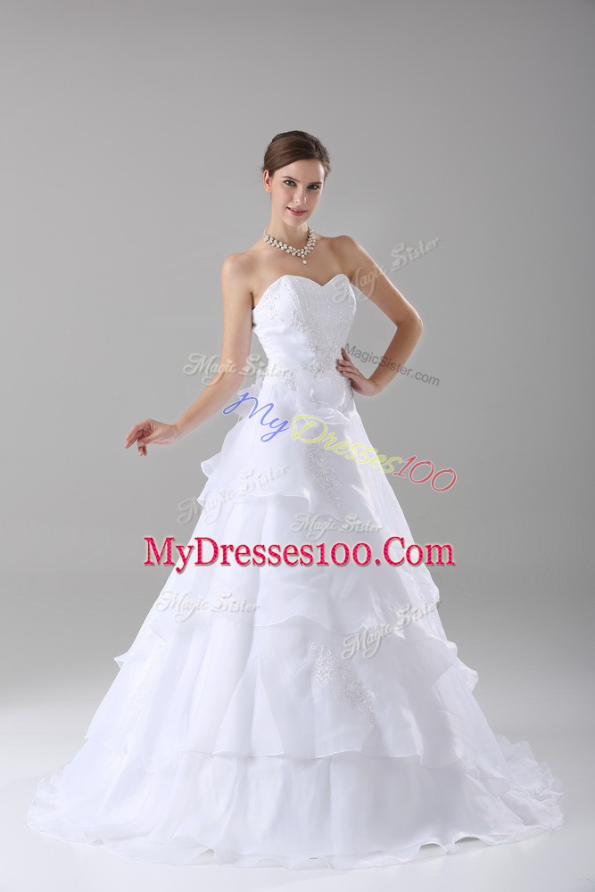 Dazzling A-line Sleeveless White Wedding Gown Brush Train Lace Up