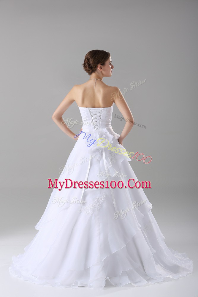 Dazzling A-line Sleeveless White Wedding Gown Brush Train Lace Up