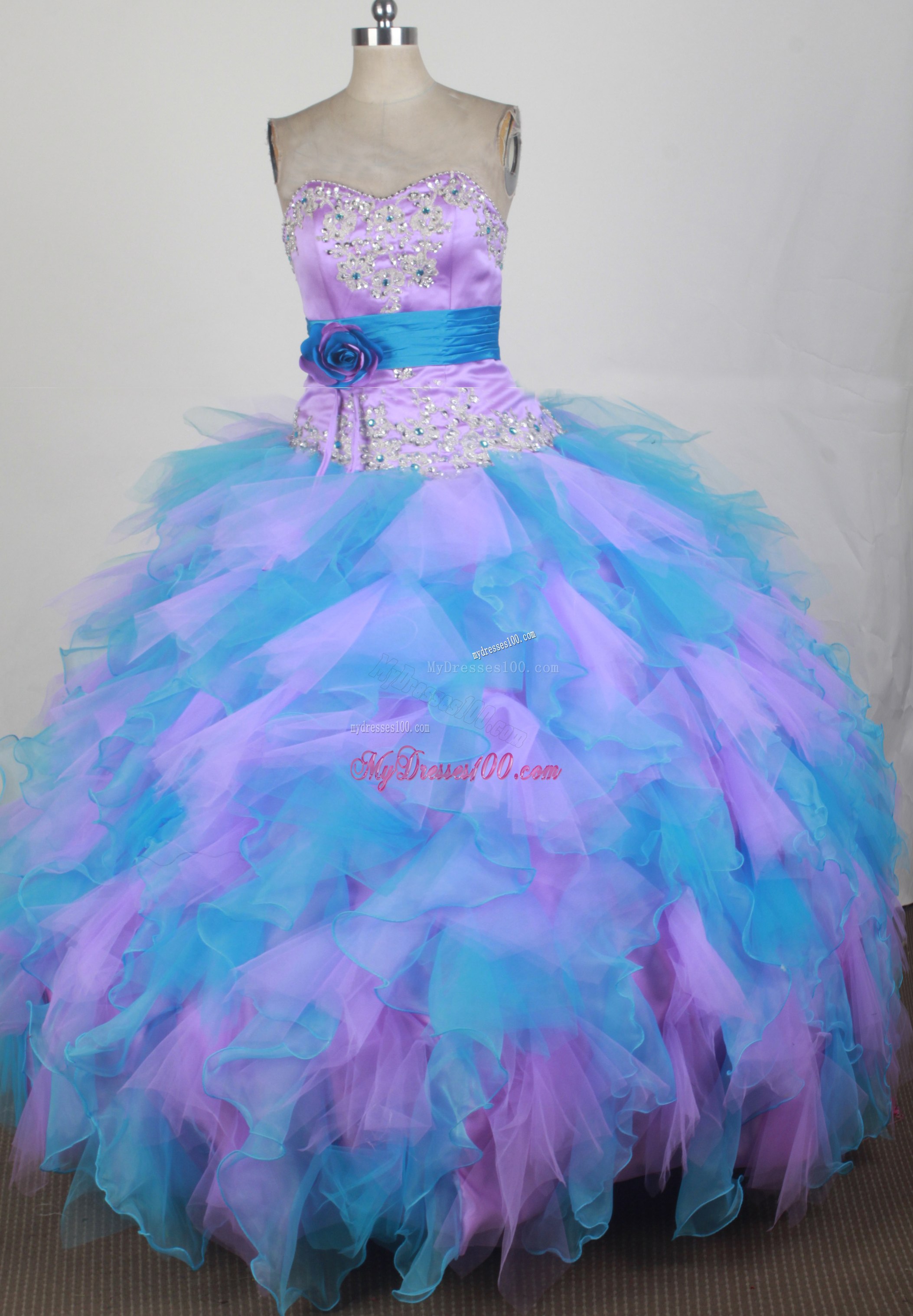 Blue and Lilac Quinceanera Dress with Ruffles and Flower