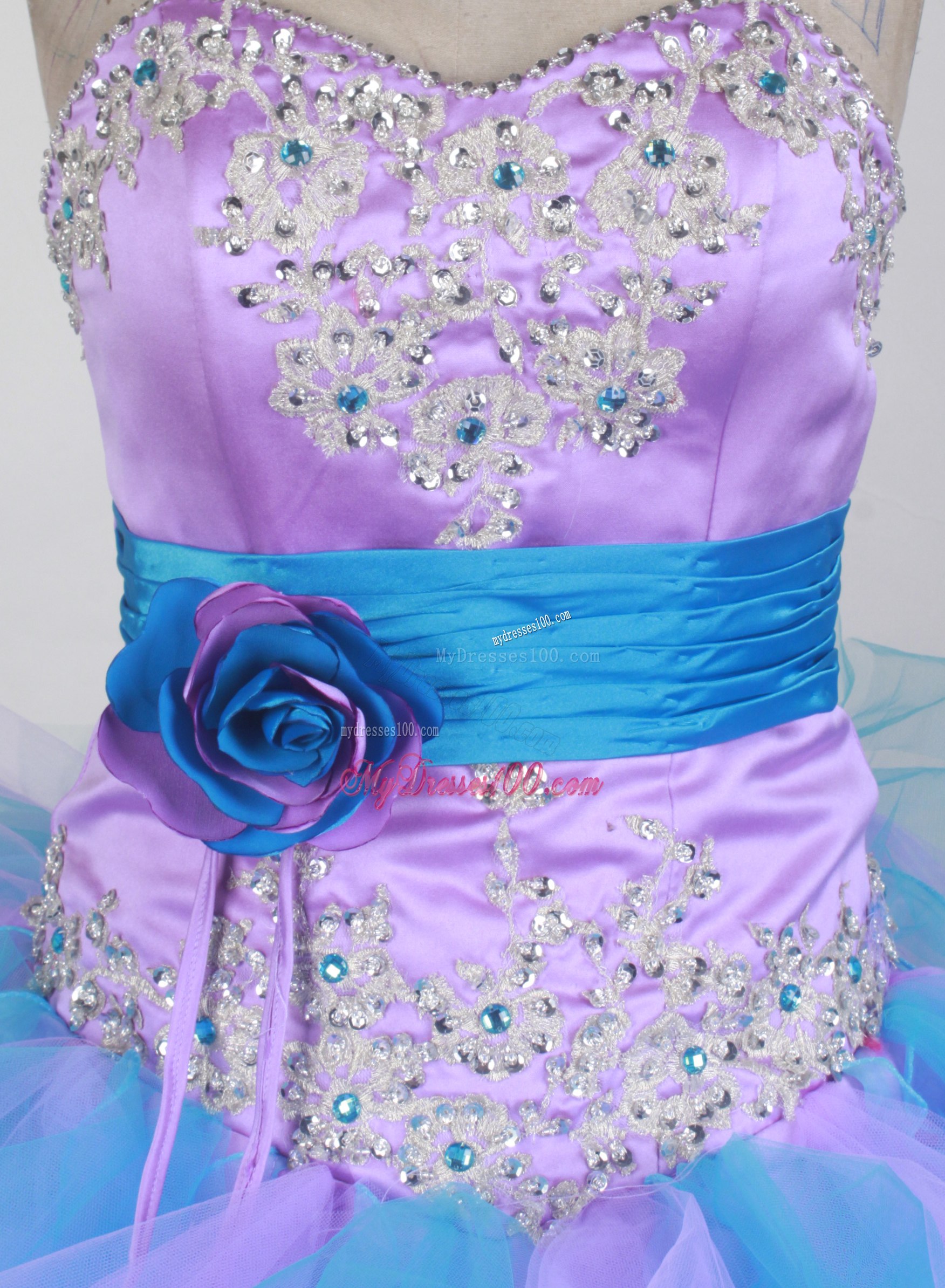 Blue and Lilac Quinceanera Dress with Ruffles and Flower