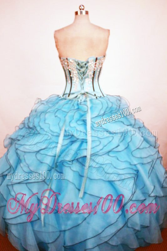 Light Blue Bodice Dress for Quince with Ruffled Layers and White Appliques