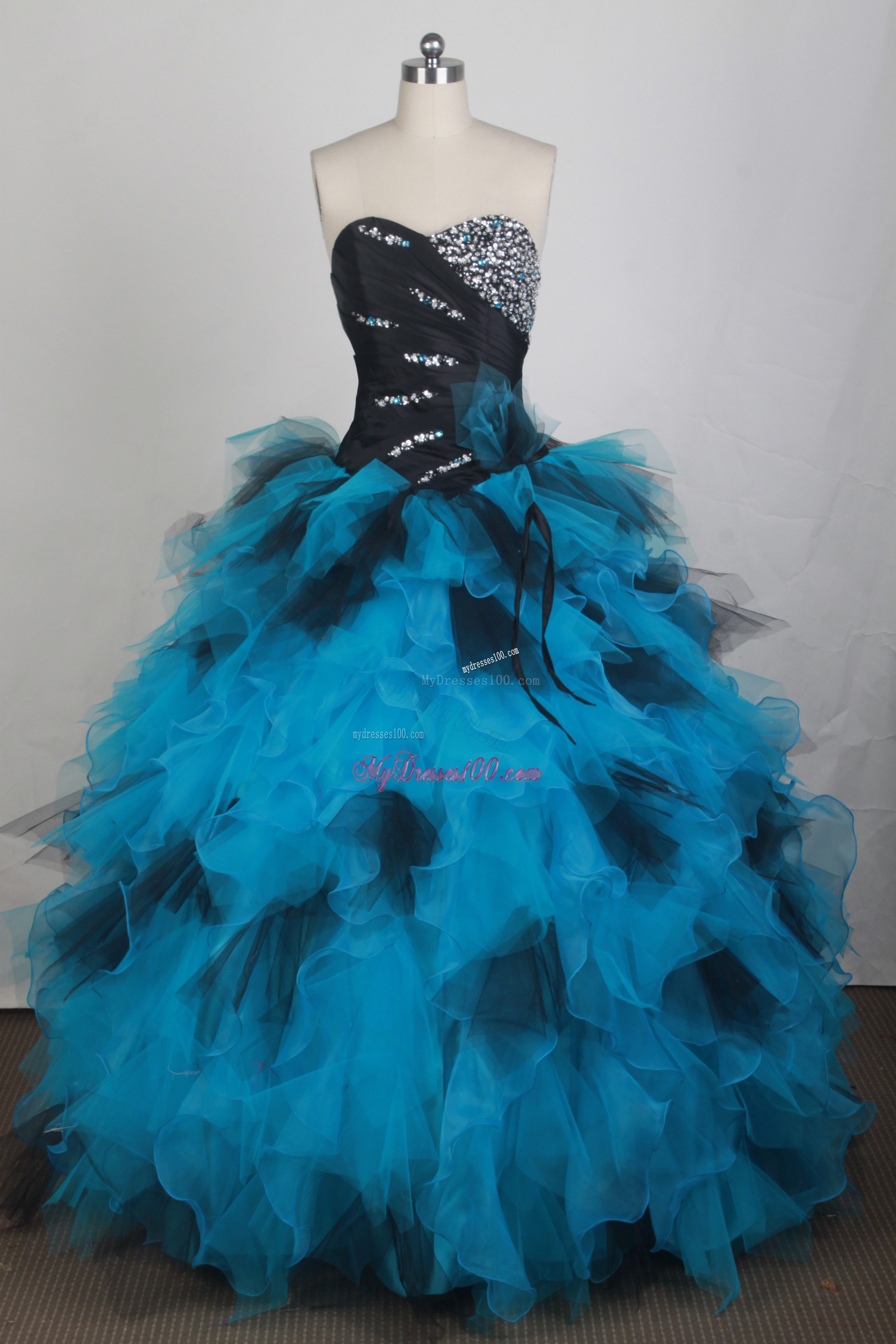 Blue and Black Quinceanera Dress with Beading and Ruffles