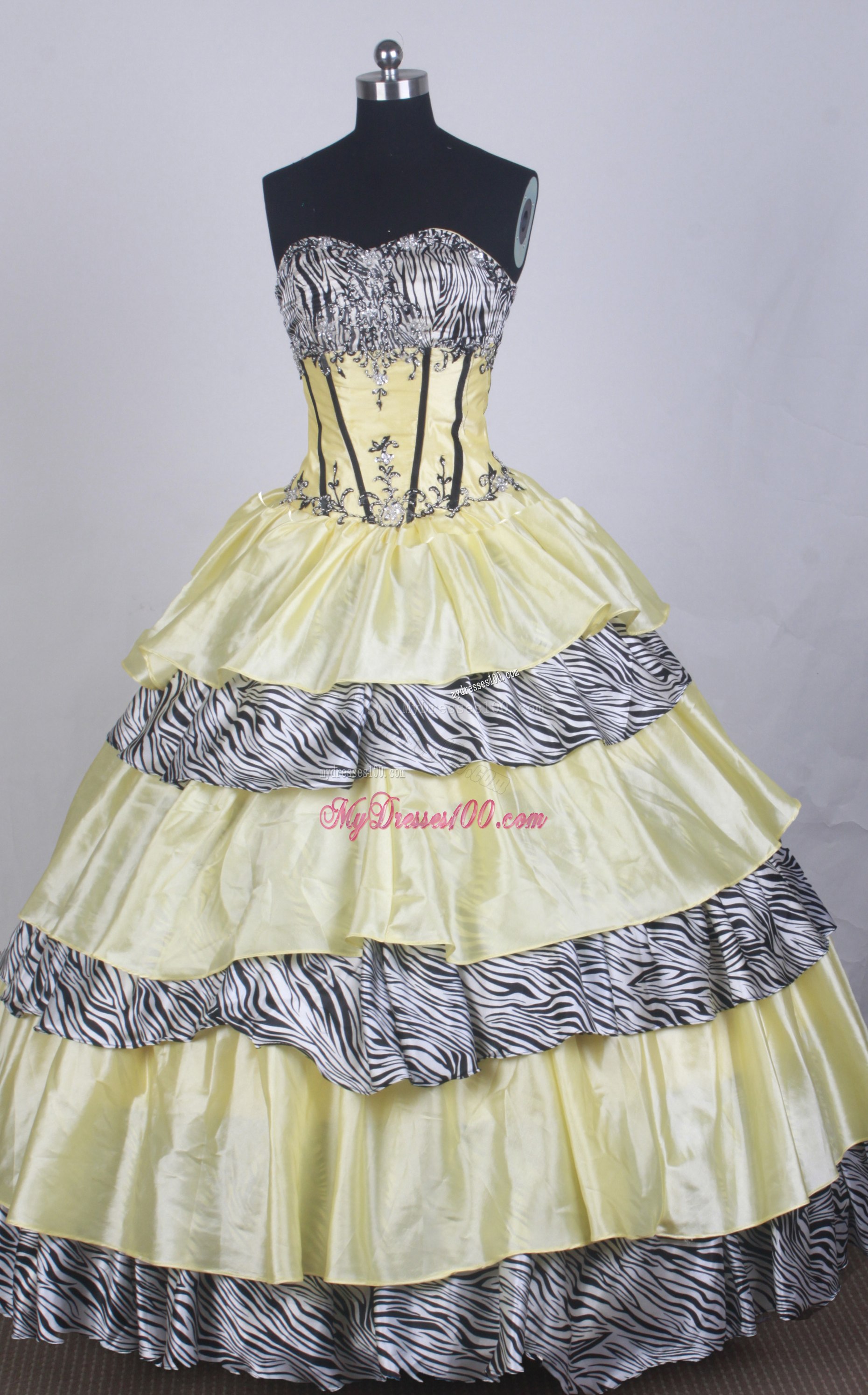 Appliqued Yellow Quinceanera Dress with Layers and Zebra Print