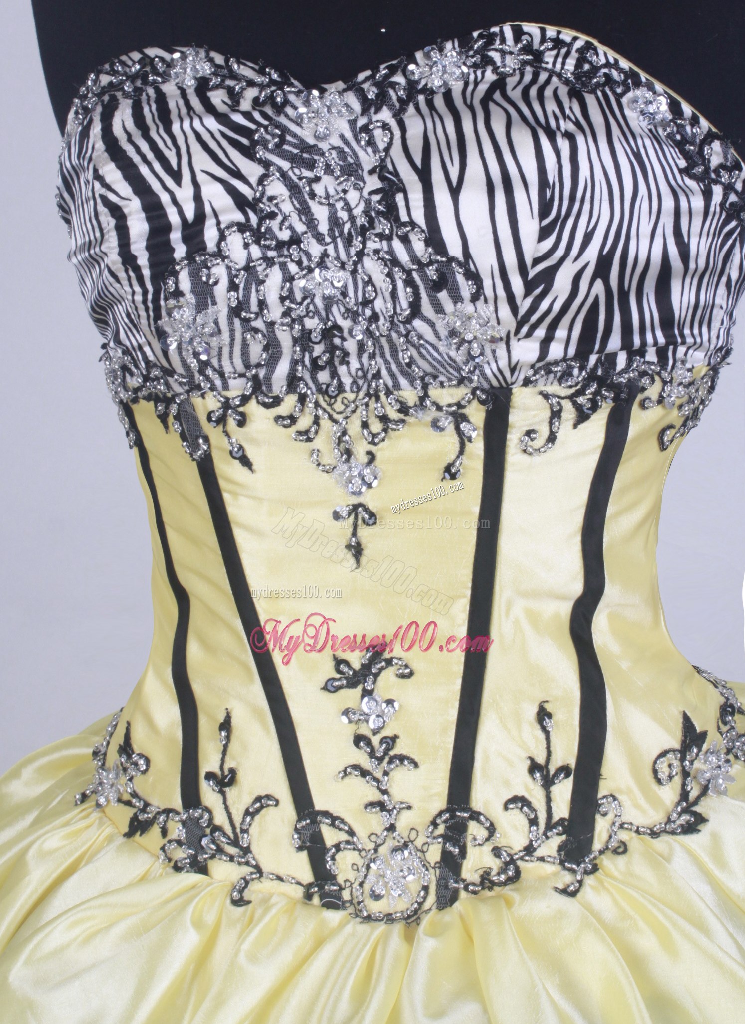 Appliqued Yellow Quinceanera Dress with Layers and Zebra Print