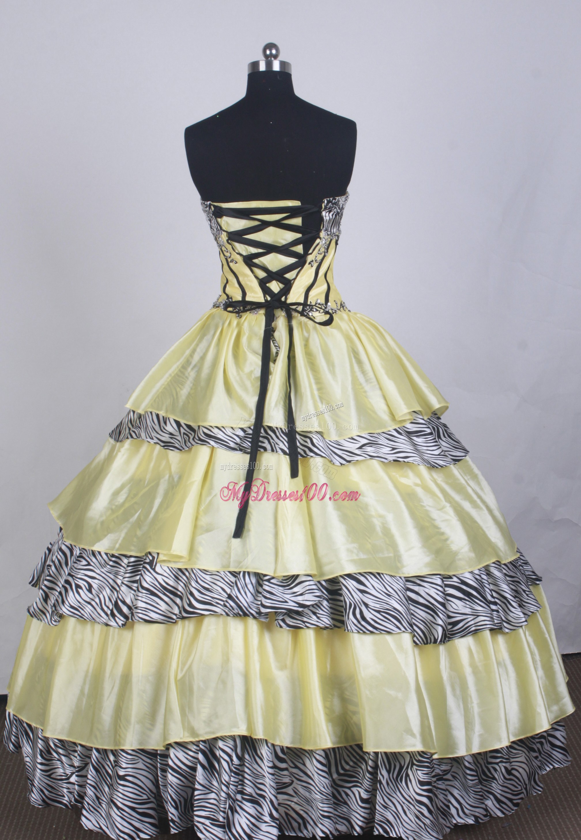 Appliqued Yellow Quinceanera Dress with Layers and Zebra Print