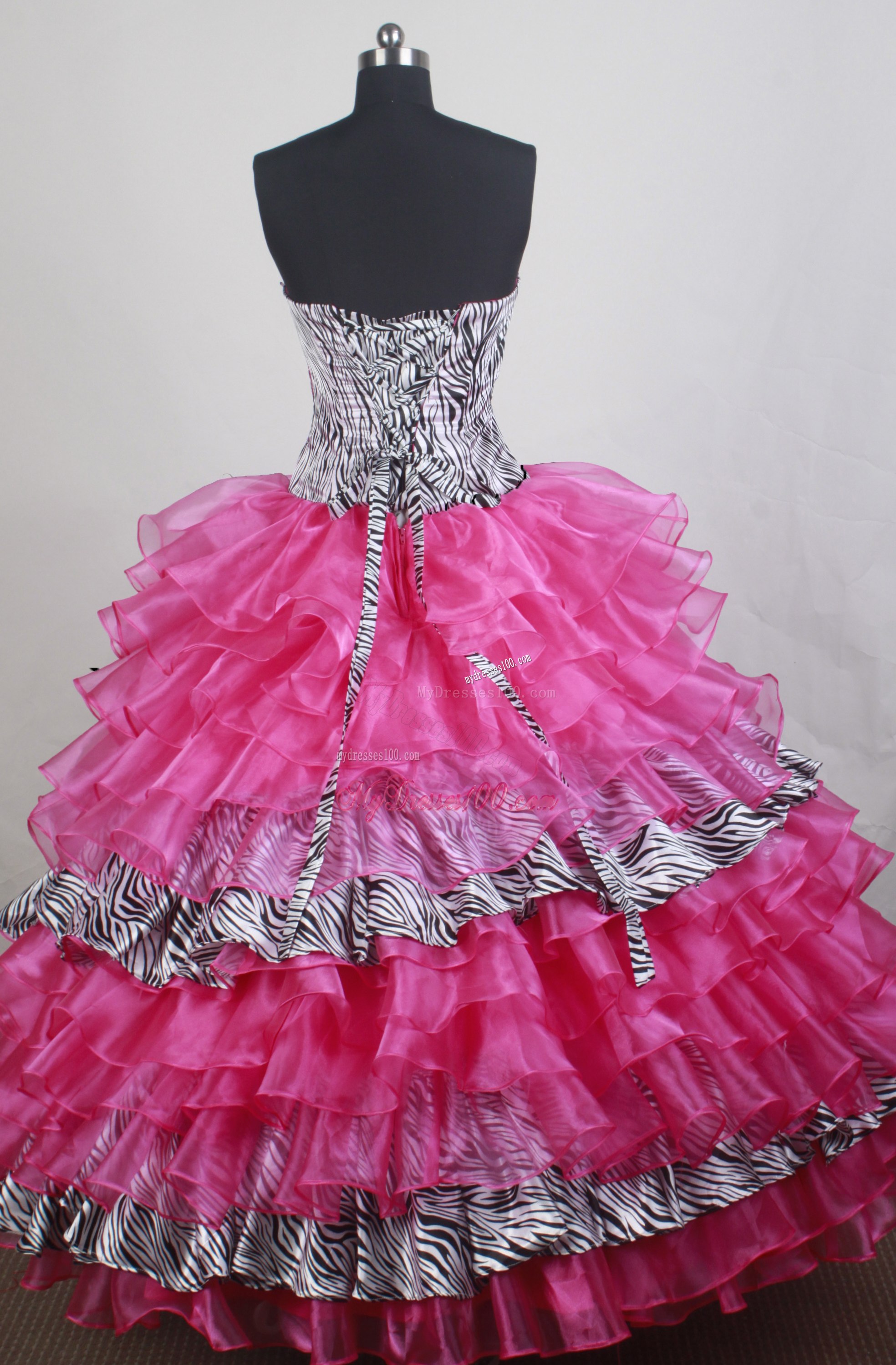Hot Pink Quinceanera Gown with Ruffled Lauers and Zebra Print