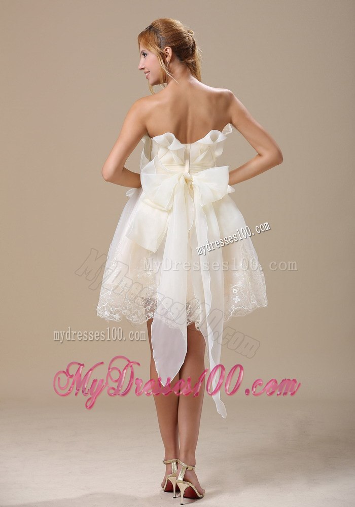 Strapless White Bow and Hand Made Flowers In Sacramento Californ