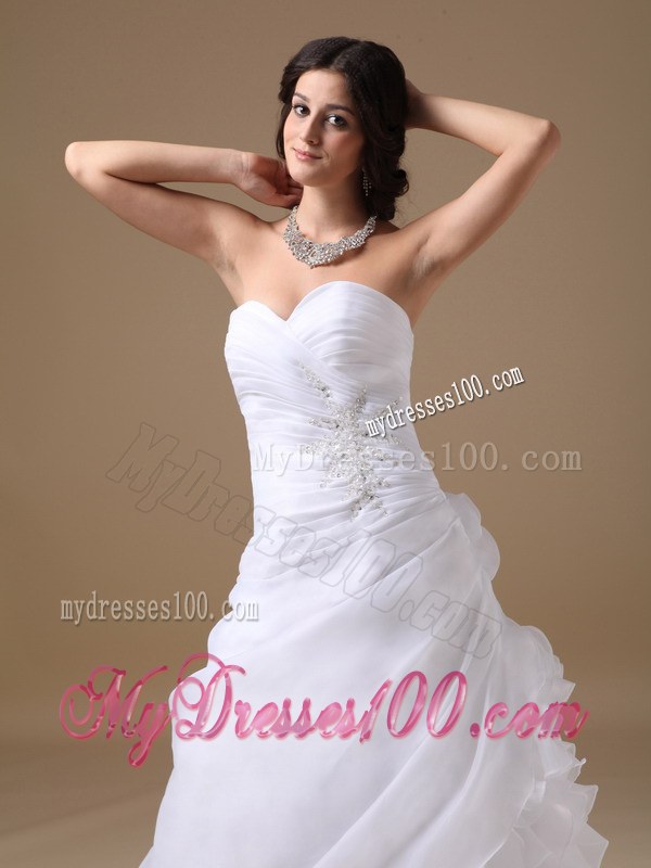 Elegant Sweetheart Court Train Beaded Wedding Gowns with Ruffles