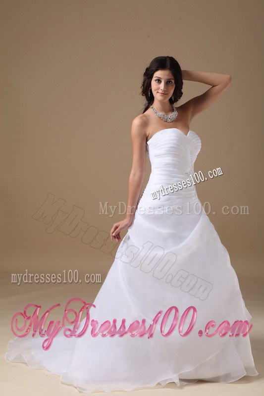 Elegant Sweetheart Court Train Beaded Wedding Gowns with Ruffles