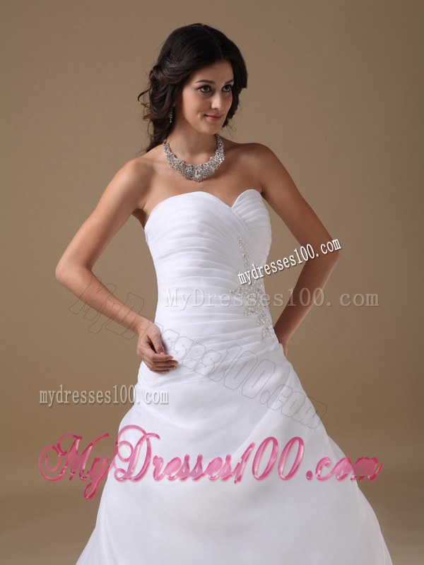 Elegant Sweetheart Court Train Beaded Wedding Gowns with Ruffles