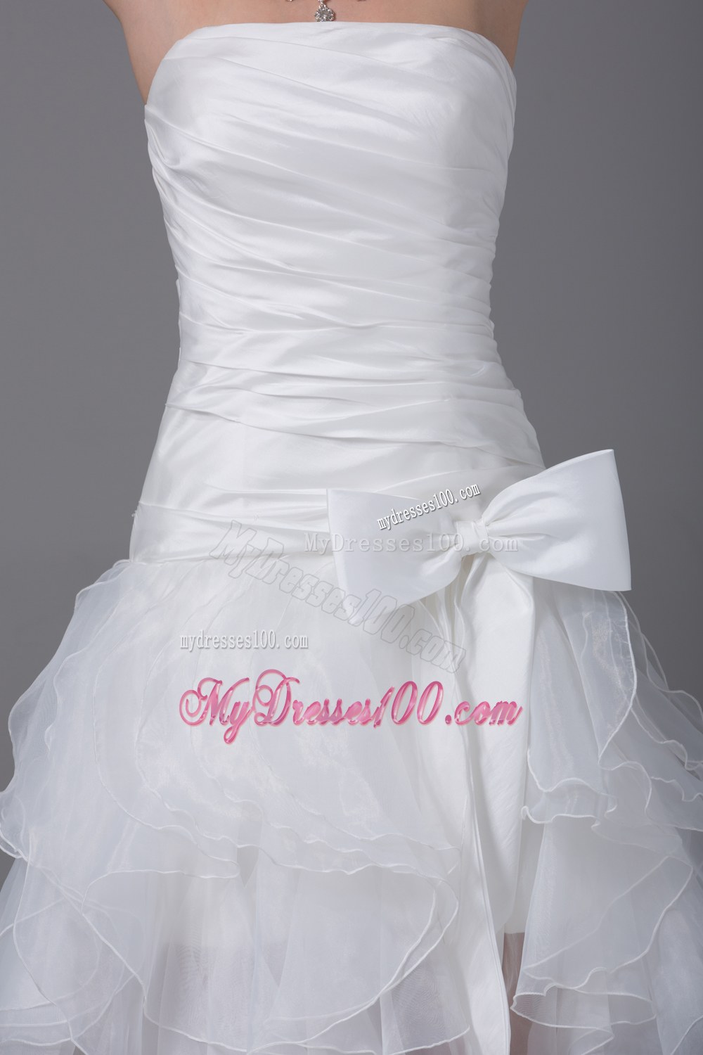 High-low Strapless Wedding Dress with Ruffled Layers and Bow