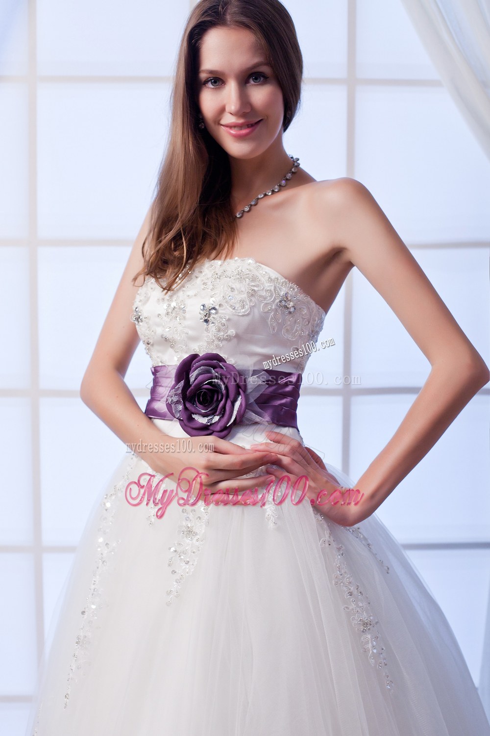 Luxurious Strapless Wedding Dress with Beading and Flowers Sash