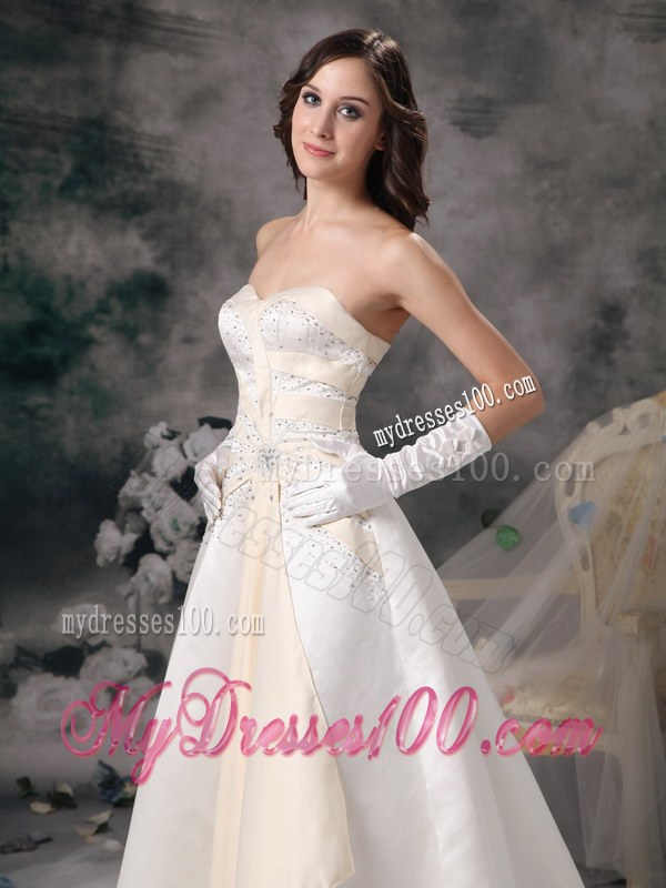 White and Champagne Sweetheart Brush Train Wedding Dress with Beading
