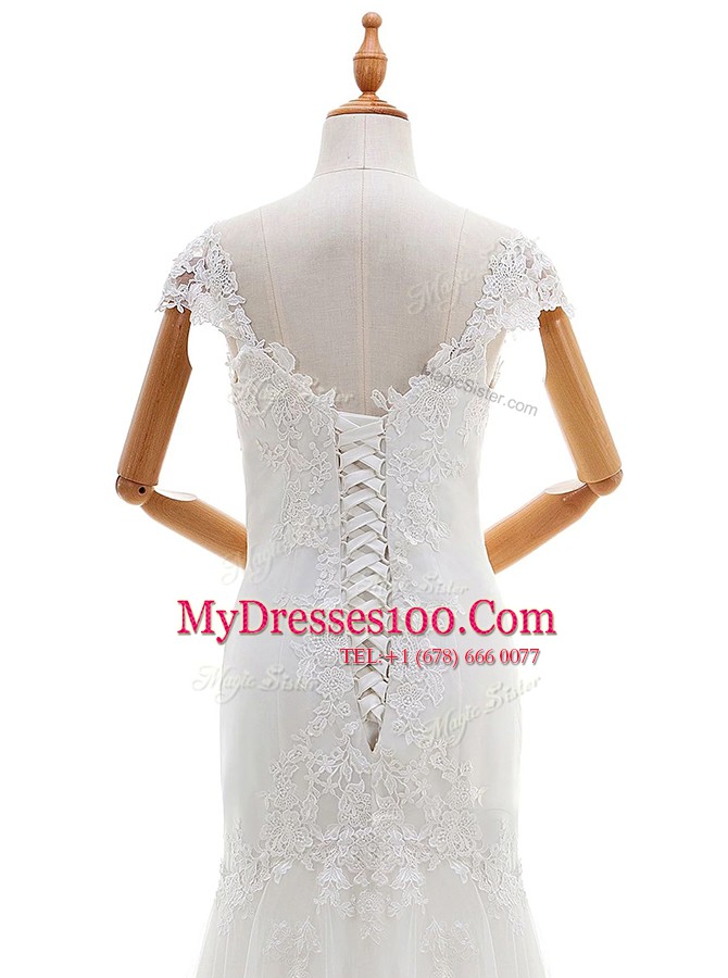 Attractive White Cap Sleeves Lace and Appliques Floor Length Wedding Gown