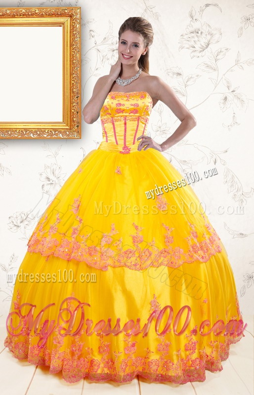 2016 Exquisite Strapless Gold Quinceanera Dresses with Appliques