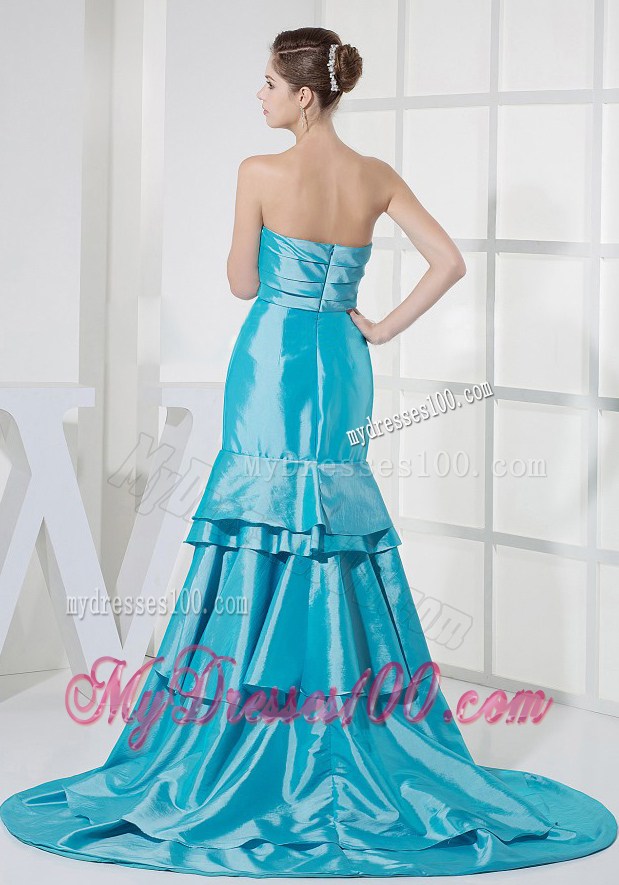 Ruffled Layers Decorate Aqua Blue Brush Train Celebrity Dress