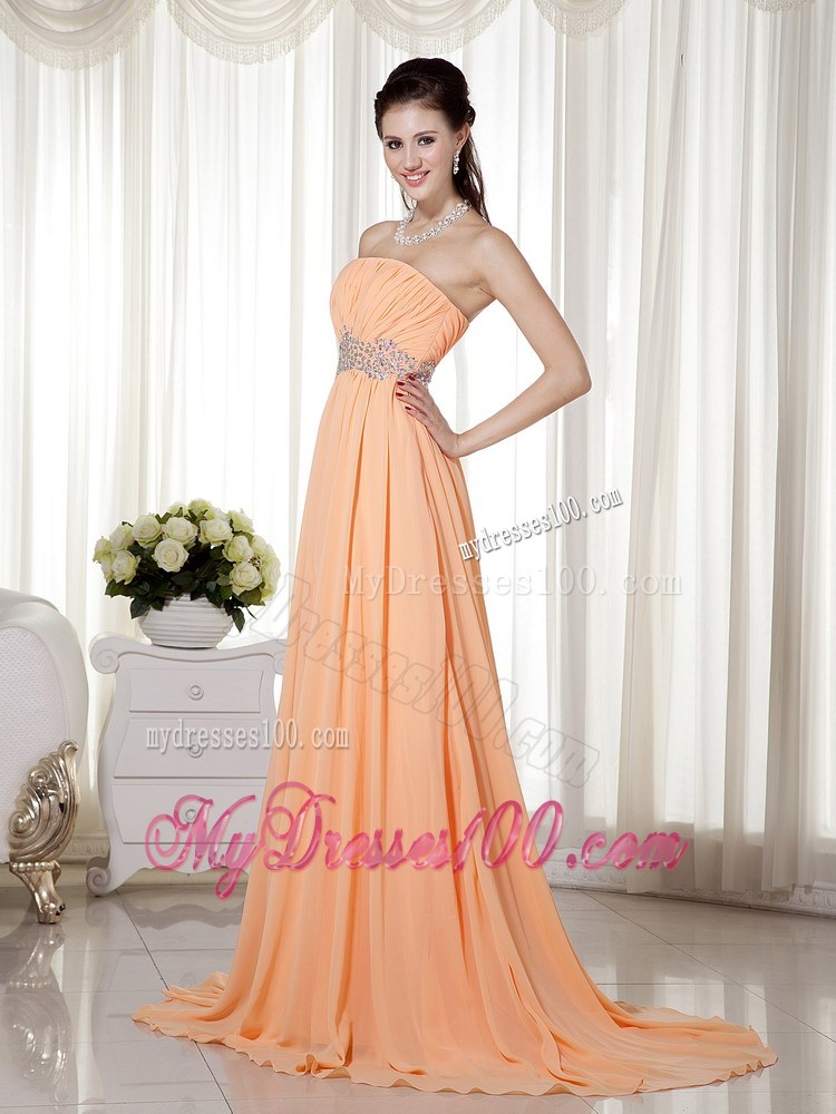 Light Orange Strapless Brush Train Beading and Ruching Evening Dresses