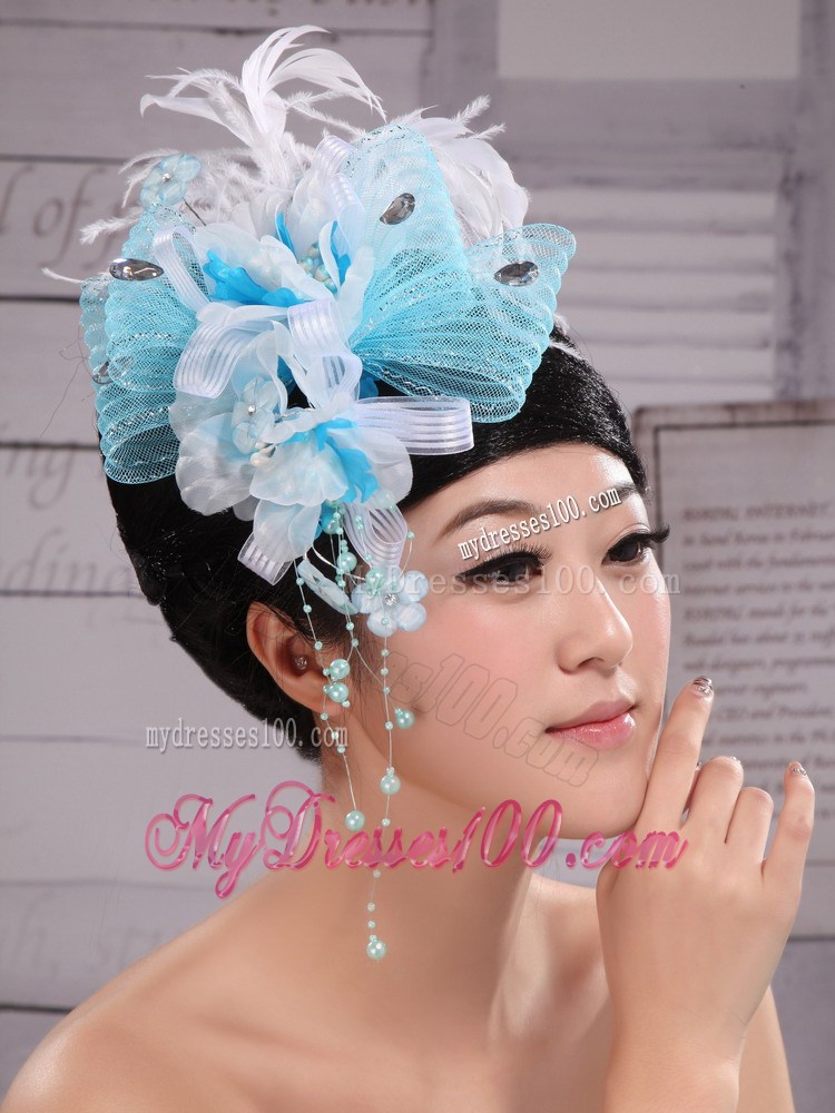 Feather and Rhinestones Decorate Aqua Blue Headpieces