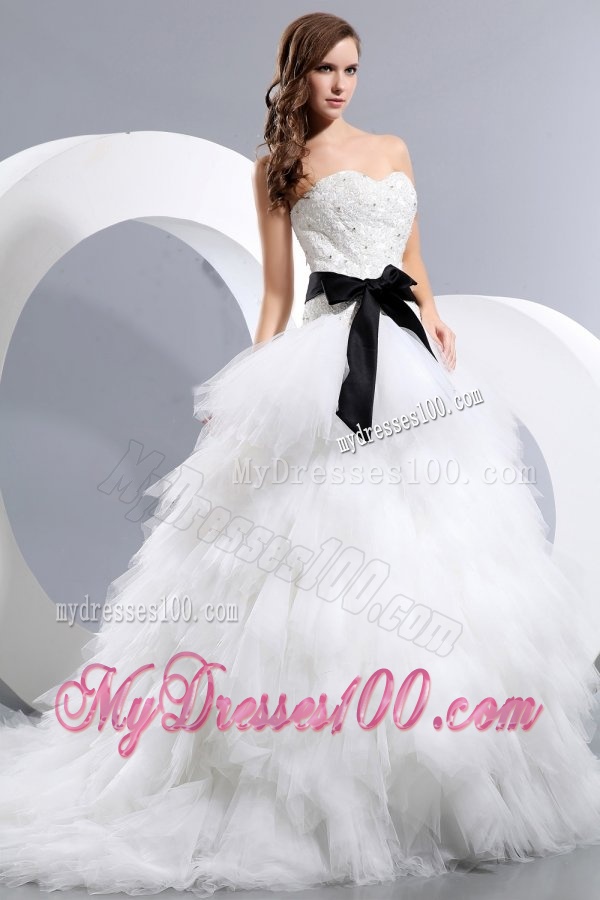 Luxurious A-Line Sweetheart Beading Court Train Tulle Wedding Dress