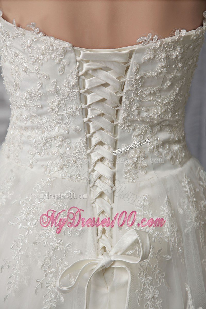Sweetheart Strapless Brush Train White Wedding Gown with Appliques