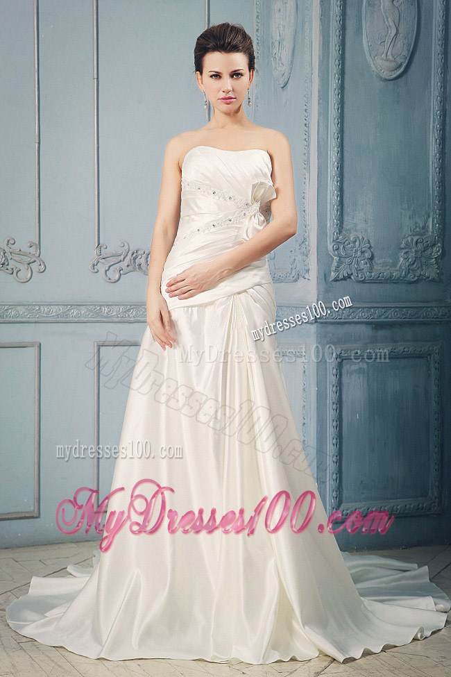 Beaded Appliques and Ruches Accent Chapel Train Bridal Gown with Bow