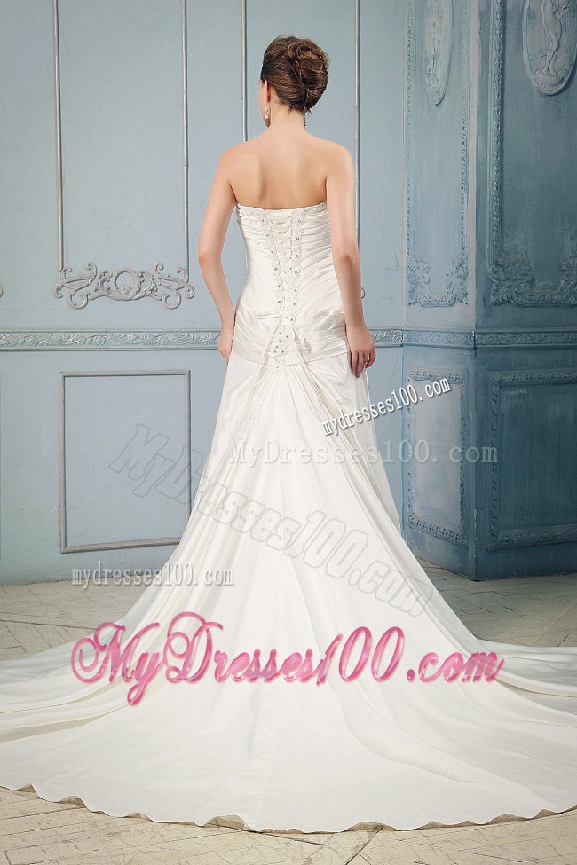 Beaded Appliques and Ruches Accent Chapel Train Bridal Gown with Bow