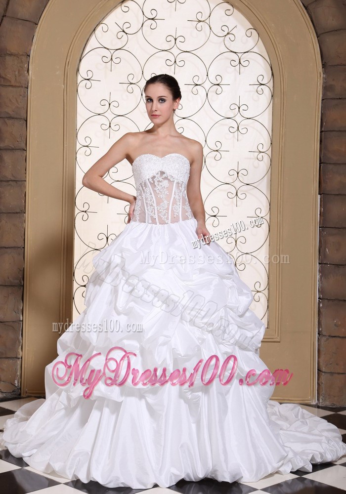 Pick-ups and Appliques Accent Bridal Gown with Sheer Waist Chapel