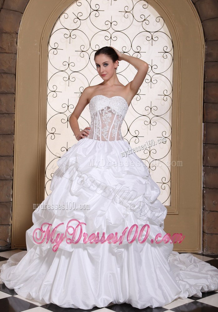 Pick-ups and Appliques Accent Bridal Gown with Sheer Waist Chapel