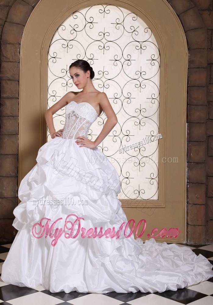 Pick-ups and Appliques Accent Bridal Gown with Sheer Waist Chapel