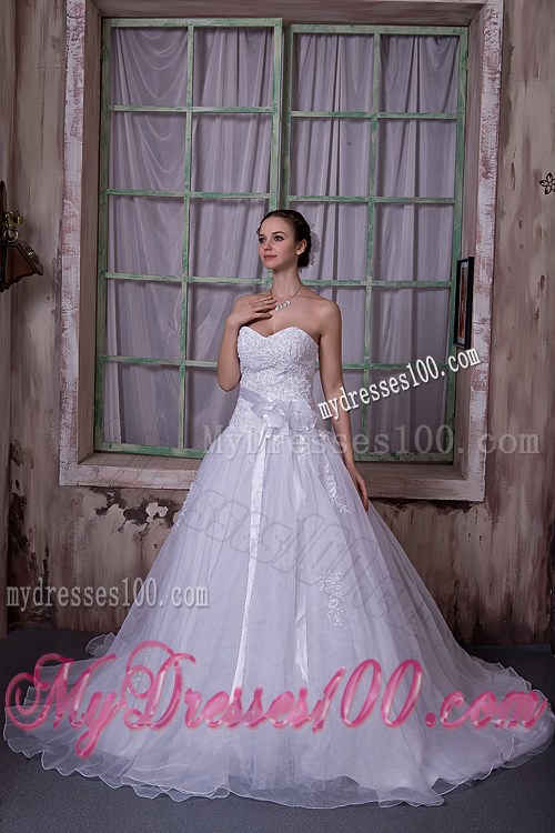 Appliques and Sash Accent on Chapel Train Sleeveless Wedding Gown