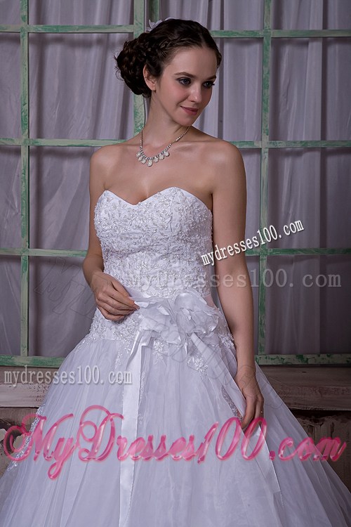 Appliques and Sash Accent on Chapel Train Sleeveless Wedding Gown