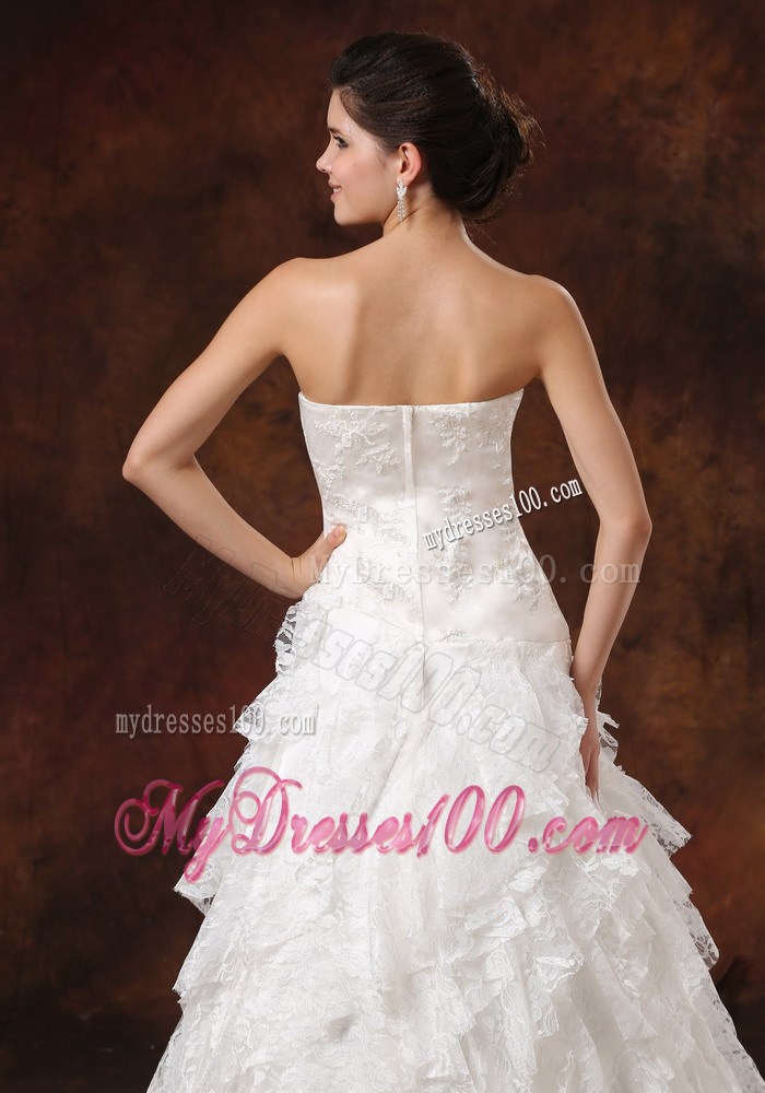 Ruffled Layers and Hand Made Flowers Decorated Wedding Dress