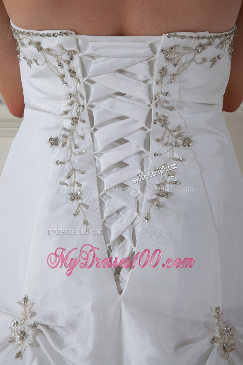 Beaded Appliques and Pick-ups Decorate Court Train Wedding Dress