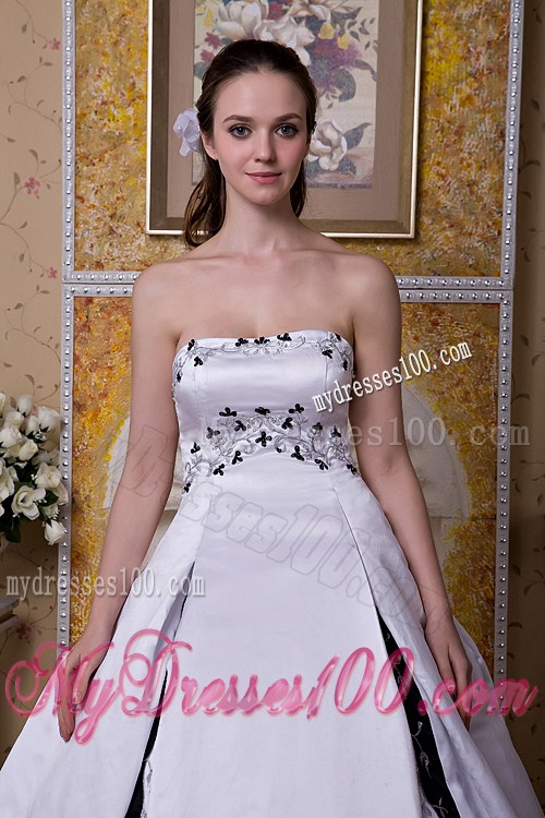 White Puffy Court Train Dress for Wedding Decorated with Black Embroideries