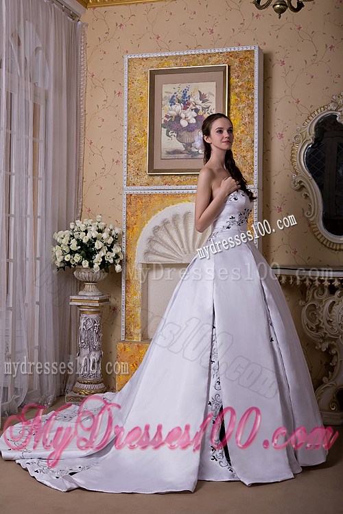 White Puffy Court Train Dress for Wedding Decorated with Black Embroideries