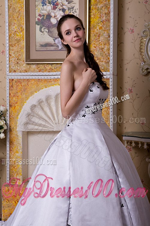 White Puffy Court Train Dress for Wedding Decorated with Black Embroideries