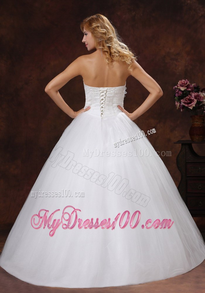 Beading and Hand Made Flowers Decorate Strapless Wedding Gown