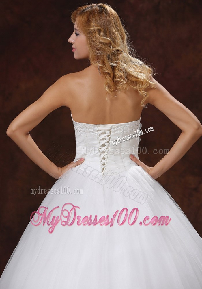 Beading and Hand Made Flowers Decorate Strapless Wedding Gown